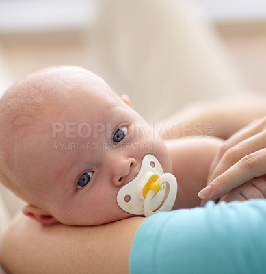 Buy stock photo Newborn, baby and portrait pacifier or mother arms comfort, safe or happy place. Child, face or dummy mouth or parent for bed sleep relax or quality time care, healthy development or love kid bonding