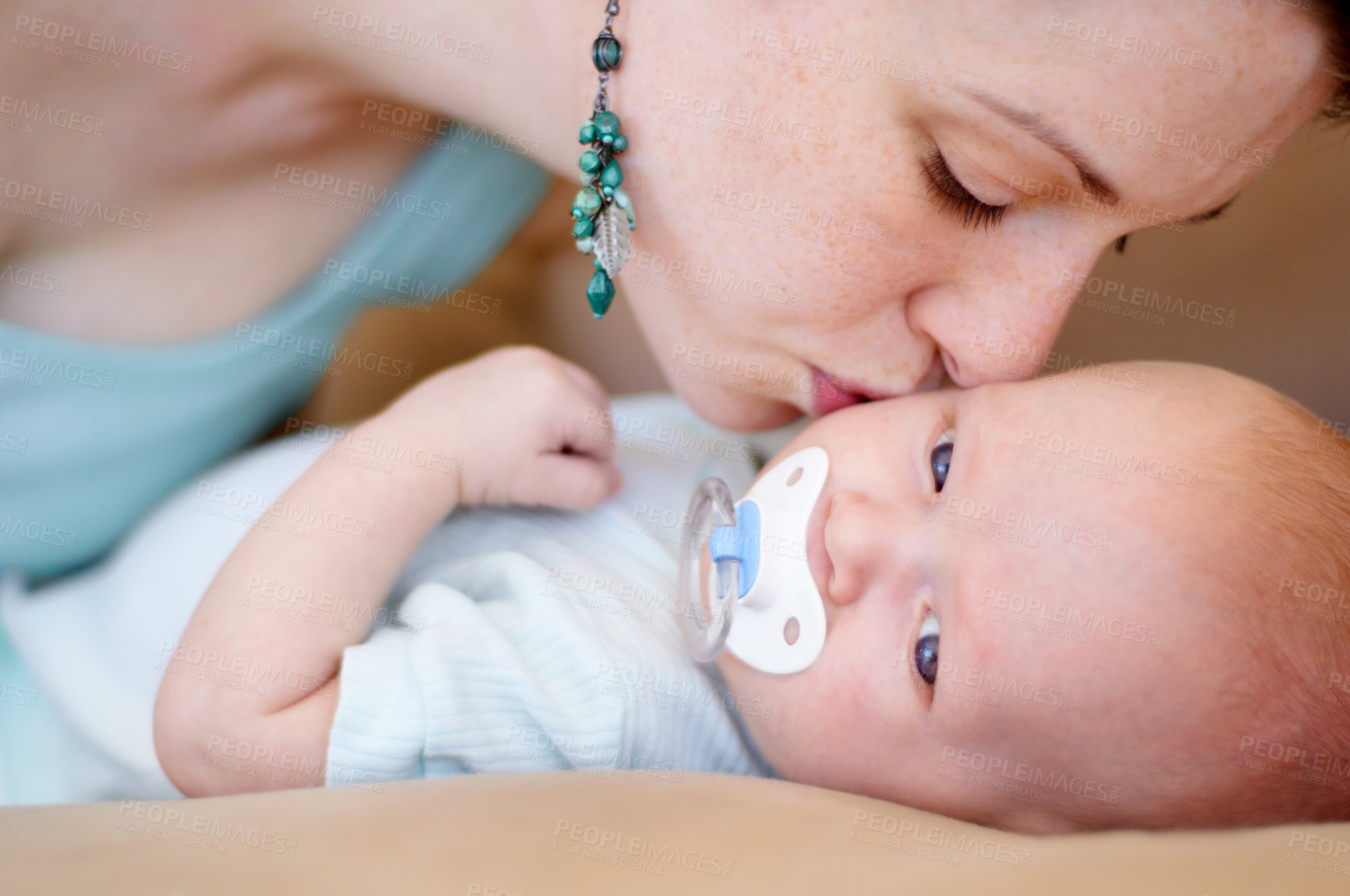 Buy stock photo Kiss, love or mother with newborn or baby for care or bonding together to nurture child development. Home, face or single parent mom with infant for trust, growth or safety in family house to relax