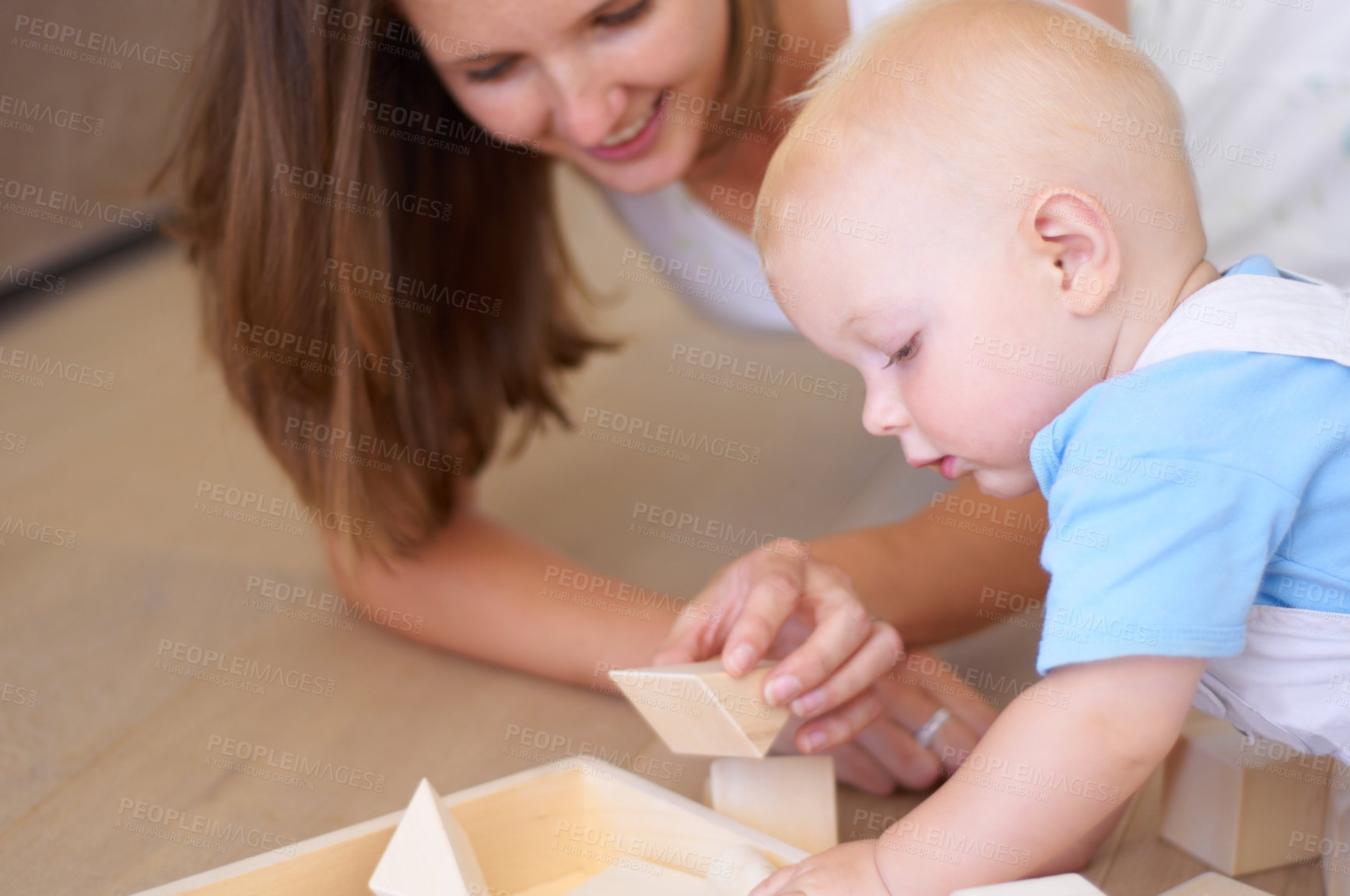 Buy stock photo Baby, mother with toy or wood building blocks for child development,  help learning or knowledge. Mom, boy and teaching toddler to play with toys, learn and grow on floor of living room in home