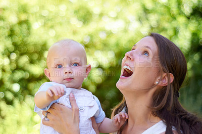 Buy stock photo Woman, baby and smile outdoor in garden for care, love or bonding on holiday, summer sunshine or thinking. Happy mother, infant child and comic laugh in backyard, park or woods with family in spring