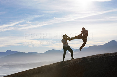 Buy stock photo Mountain top, karate men and jump, kick or fitness training in nature for body, speed or power on sky background. Martial arts, taekwondo or MMA friends workout outdoor for cardio, exercise or sports