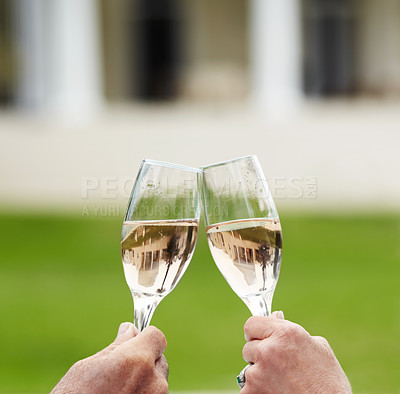 Buy stock photo Couple, married and hands with champagne in celebration of anniversary, success or retirement. Mature, man and woman with toast, drink or cheers at hotel for love, romance or quality time in bond