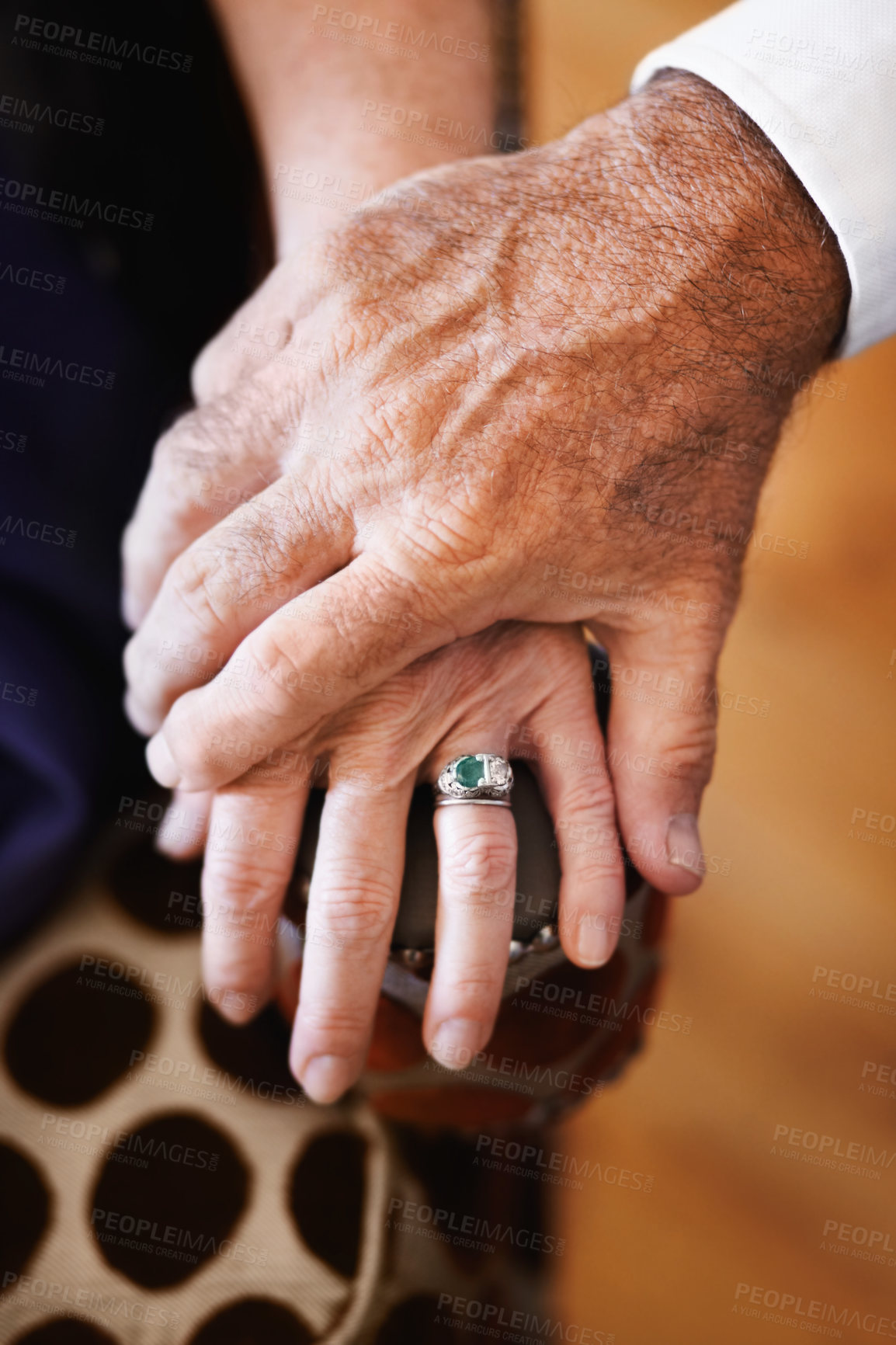 Buy stock photo Closeup, holding hands and senior couple with support, empathy and comfort with care, solidarity and loving together. Zoom, fingers and old woman with elderly man, romance or love with trust or grief