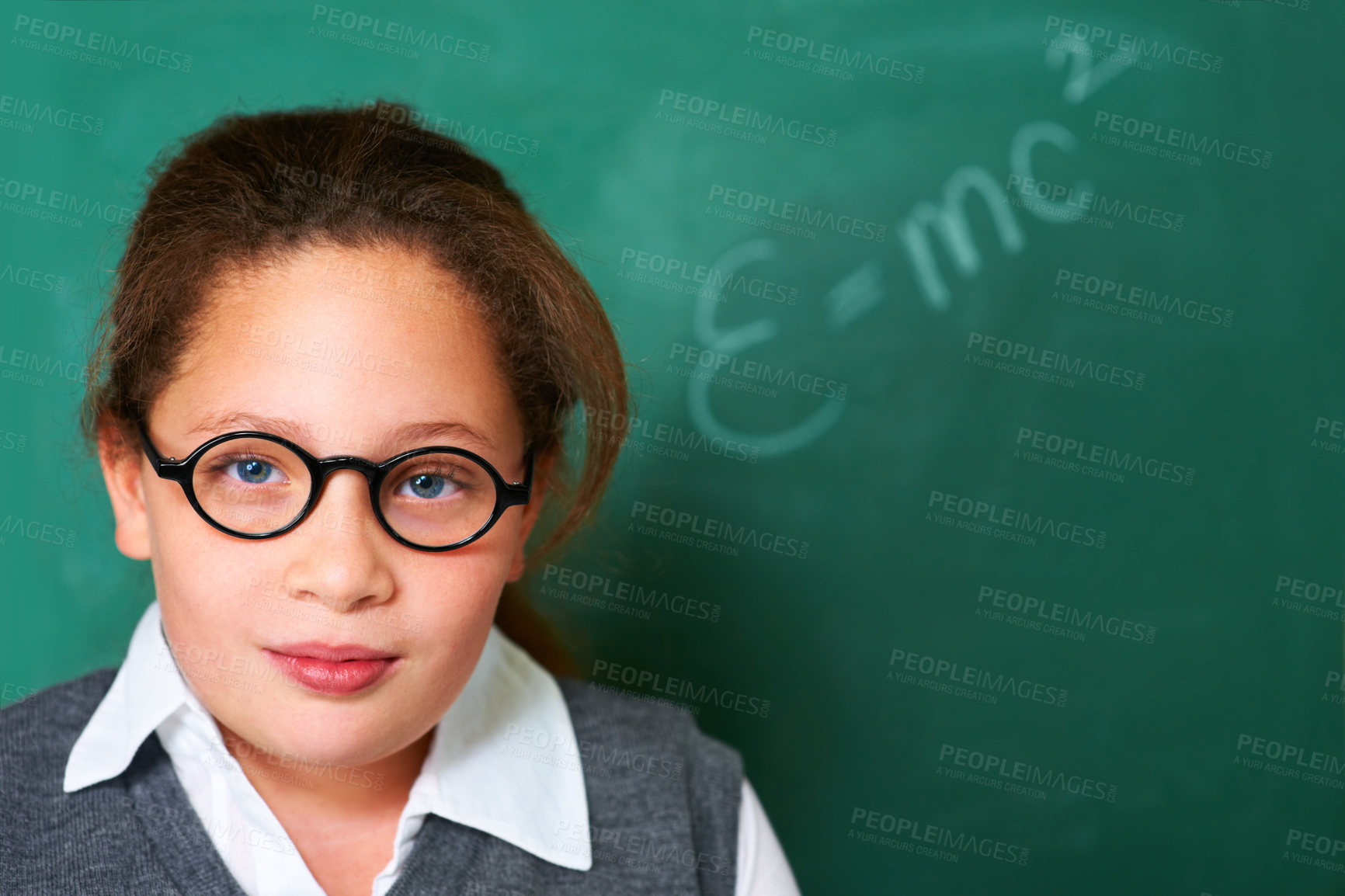 Buy stock photo Portrait of student, geek and kid by chalkboard in class for learning knowledge, education and study math on mockup space. Face, glasses and nerd at school, girl or cute child in classroom in Spain