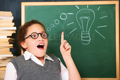 Buy stock photo Girl, thinking and lightbulb on chalkboard for solution, ideas and wow in education, learning and classroom knowledge. Child, student or school kid with vision, inspiration and light bulb doodle