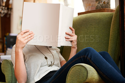 Buy stock photo Reading, sofa and person with books in library, bookstore or shop for research, learning and relax. Literature, knowledge and customer with book for education, information and mockup for hobby