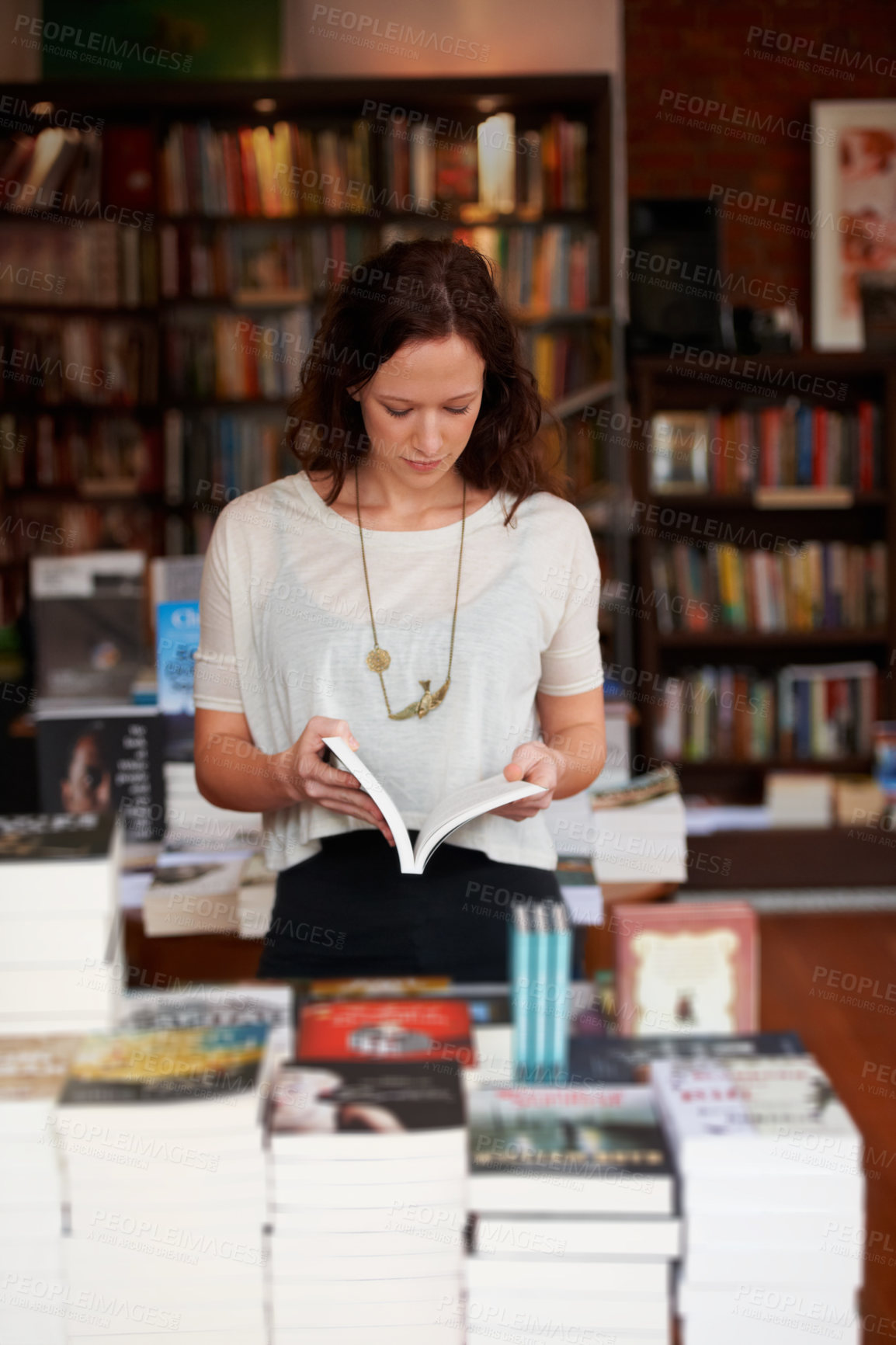 Buy stock photo Book, woman and reading in a store, library or bookstore customer and choosing a novel to buy, read or study. Girl, bookshelf and studying books for college, university or research information