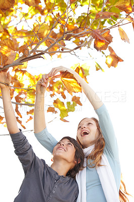 Buy stock photo Woman, autumn and nature with kid at park with smile and happy from travel, vacation and leaves. Holiday, outdoor and calm female person in New York with freedom and adventure by a tree in a garden 
