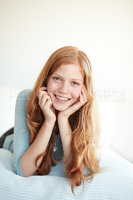 Buy stock photo Teenager, girl and portrait relax in bed smile for weekend rest, casual happy day or home comfort. Female person, face and enjoy in room for cozy indoor or vacation morning, easy carefree or positive