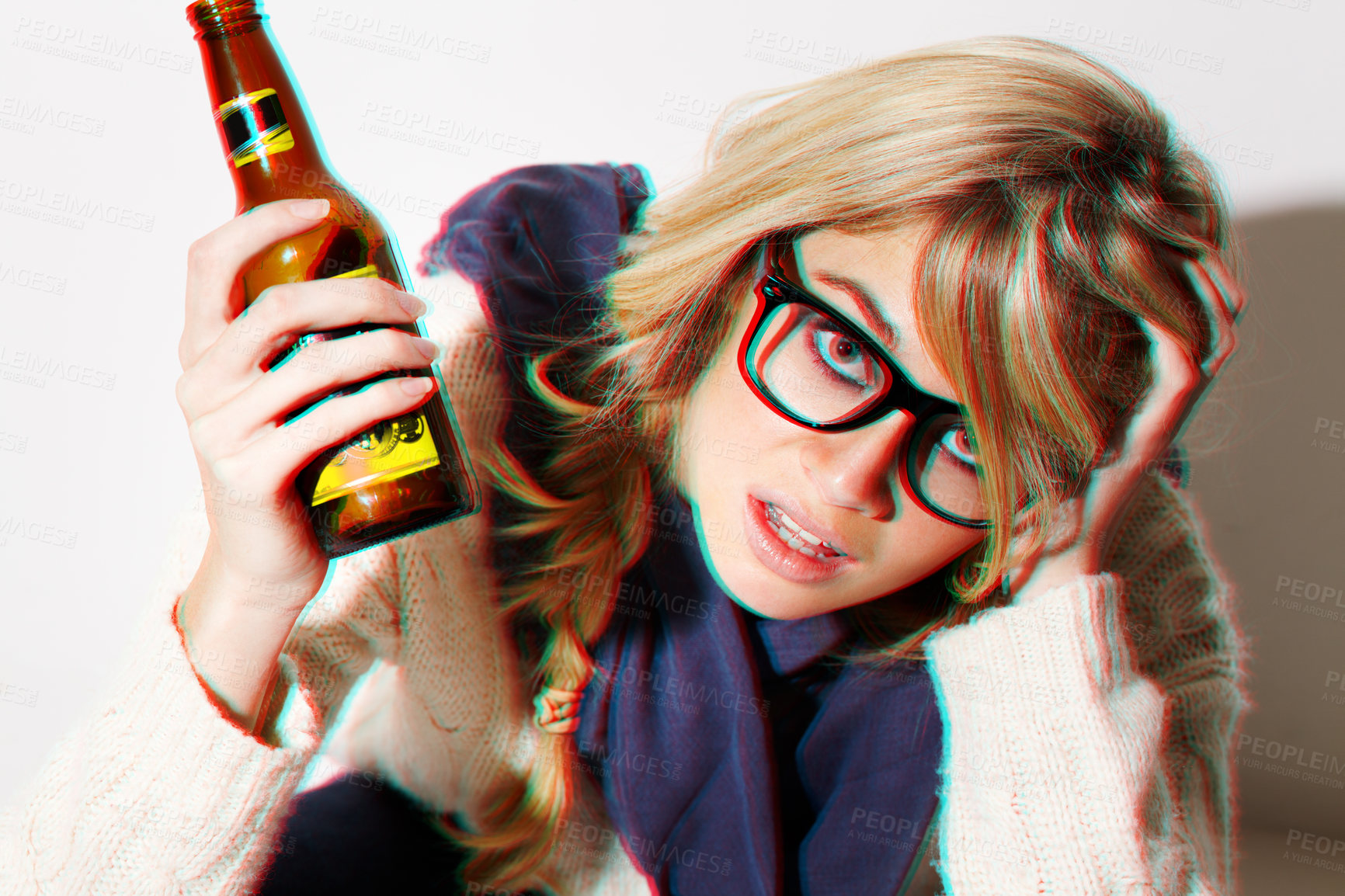 Buy stock photo Portrait, fashion and a bottle of beer with a woman in studio isolated on a white background feeling dizzy closeup. Face, alcohol and headache with a young drunk person drinking at a party or event