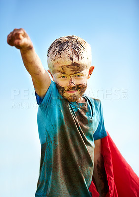 Buy stock photo A little boy dressed as a superhero and covered in mud