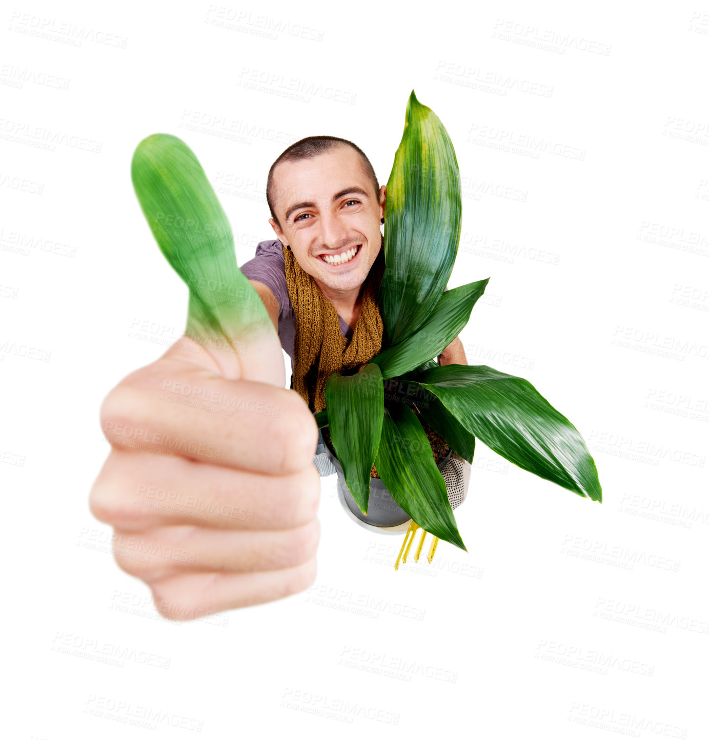 Buy stock photo A smiling young gardener holding up his green thumb