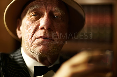 Buy stock photo Senior, man and drink of whiskey in office with crime boss thinking of mob or decision. Old, face and experienced gangster with alcohol in mafia or country club with reputation of power or danger