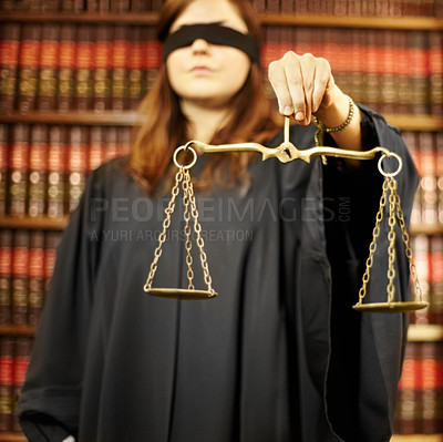 Buy stock photo Blindfolded, lawyer and closeup of a scale for justice, court decision or criminal advocate. Office, working or a legal employee holding a tool for judge, notary or legislation in the workplace
