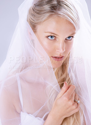Buy stock photo Beauty, bride and woman with a veil, wedding ring and commitment on a white studio background. Person, girl and model with a gown, marriage and love with fashion, event and lingerie with makeup