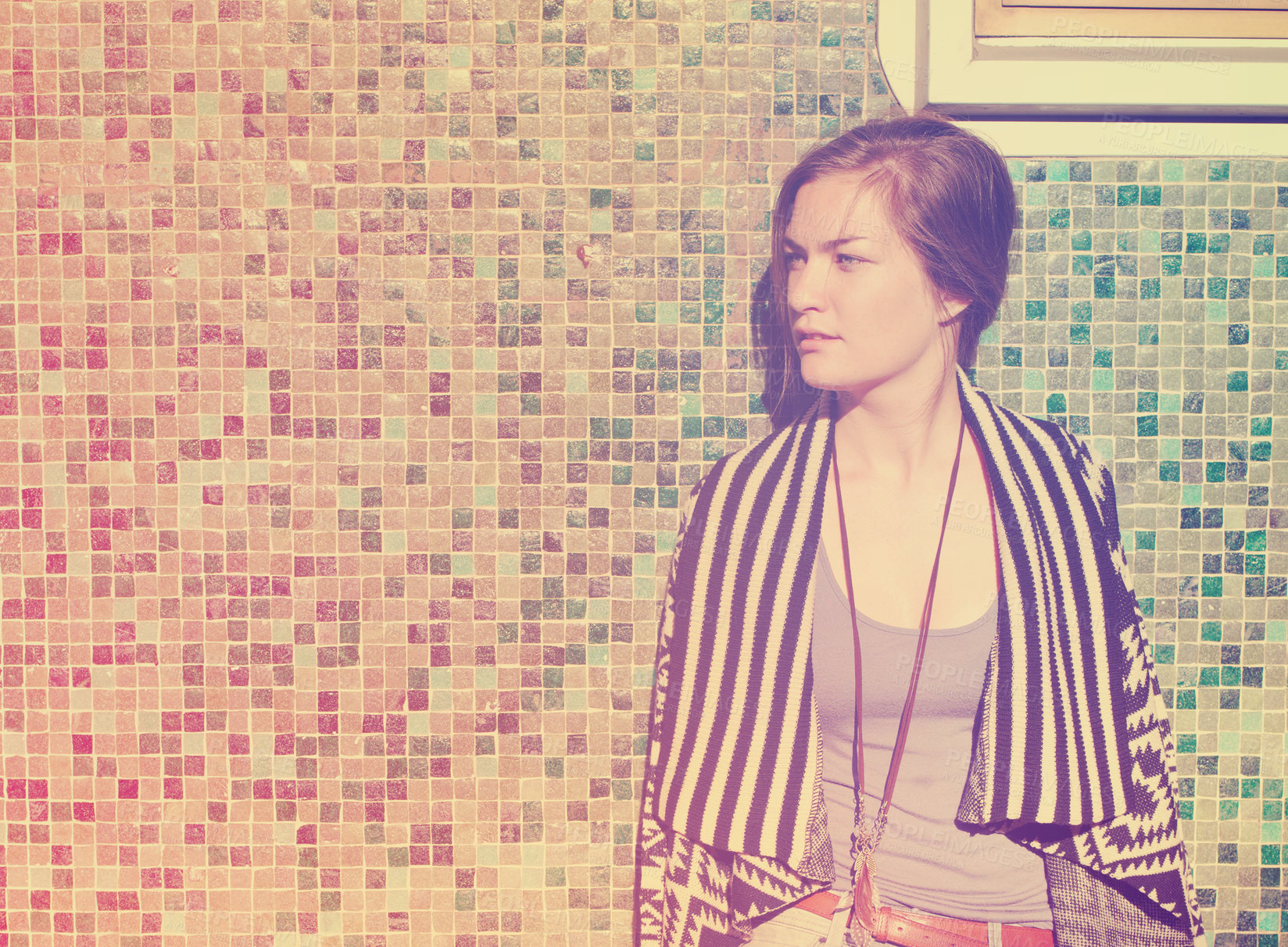 Buy stock photo Retro style image of a young woman standing against a mosaic background