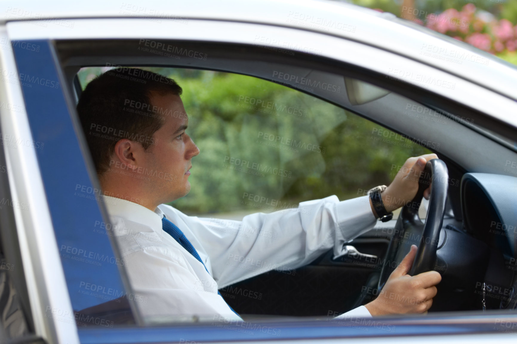 Buy stock photo Profile of a businessman driving his car to work