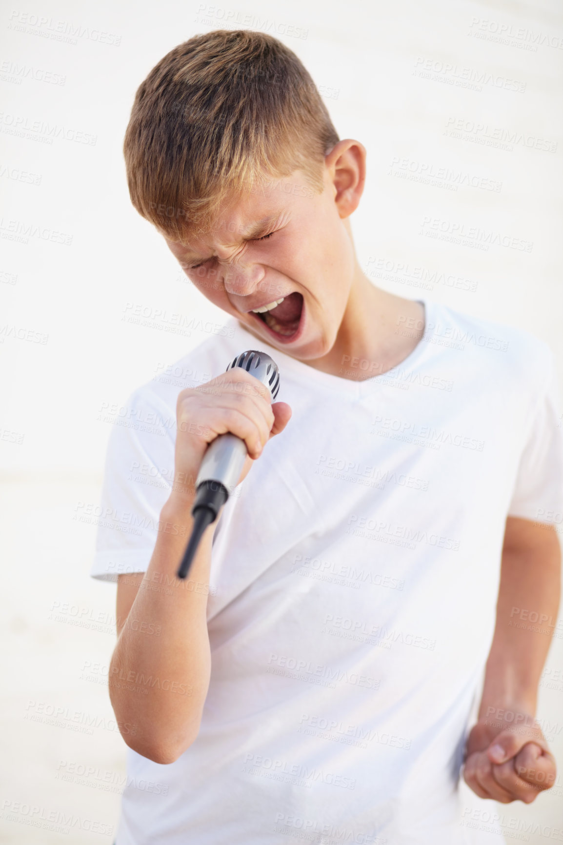 Buy stock photo Mic, karaoke and creative talent of kid in studio isolated on a white background. Child on microphone, singer and music, song and recording voice, sound or audio performance of musician on technology