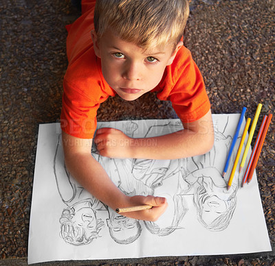Buy stock photo Portrait, boy and student with a sketch, drawing and creativity with a talent, colour and paper on the ground. Serious face, kid and child with knowledge, development and artistic with a project