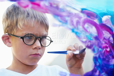 Buy stock photo Boy painting on glass, brush and creating artwork with glasses, education and learning. Person, child and kid with art, student and teaching with development, childhood and creativity with an artist