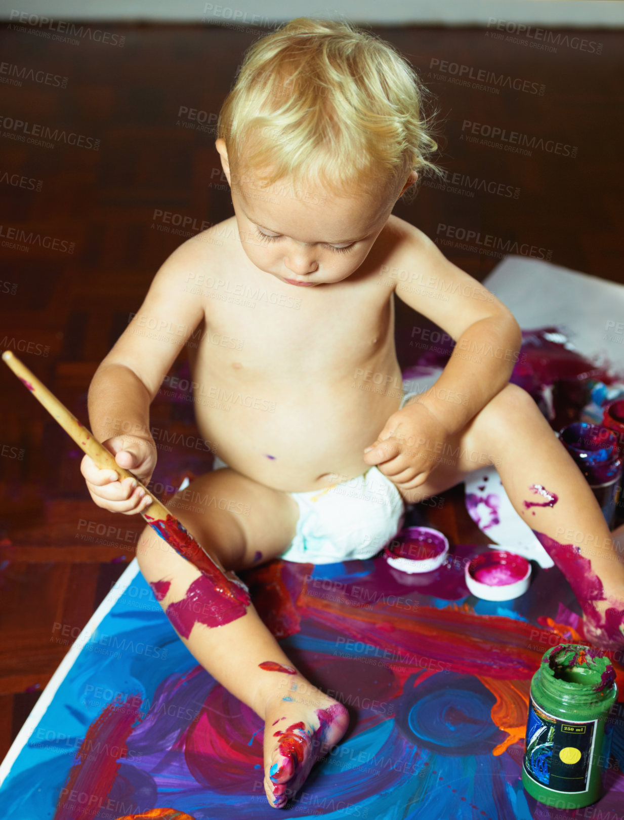 Buy stock photo Creative, painting and baby with color on canvas for child development, fun and learning. Childhood, paint and young kid with colors for creativity, artwork and education for motor skills in home