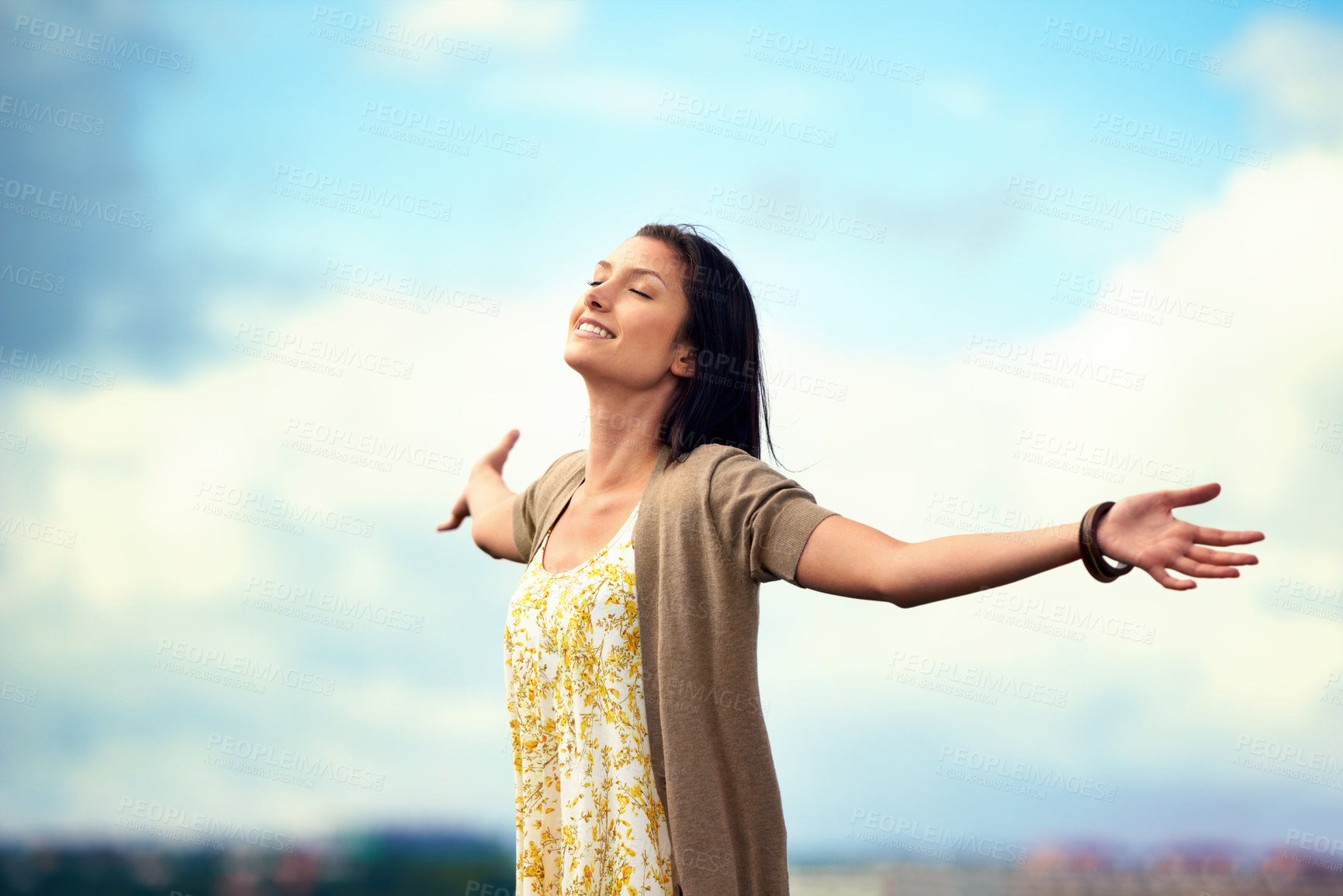 Buy stock photo Woman, arms spread and happy on rooftop, adventure and freedom on trip to Norway, joy and sky background. Female person, vacation and relax or positive for getaway, energy and stretching in holiday