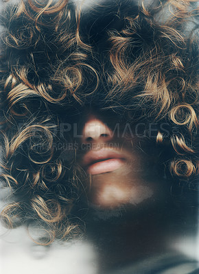 Buy stock photo Young man with his face obscured by his long, curly hair