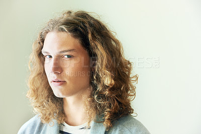 Buy stock photo Man, headshot and hair with beauty in portrait, mockup space with curly hairstyle and wellness. Young, gen z and casual clothes with curls, style and trendy, cool model and relax with fashion