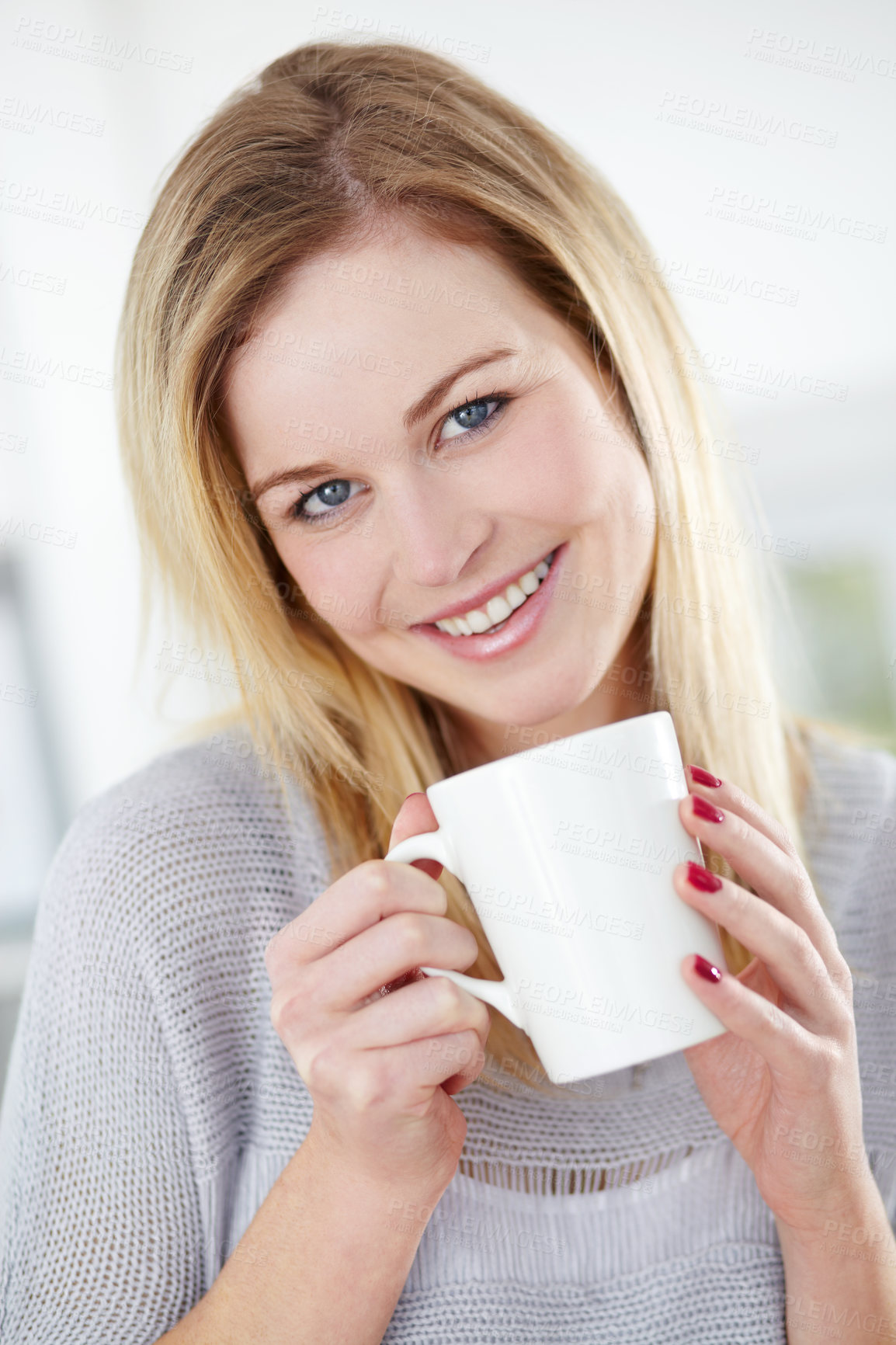 Buy stock photo Portrait, smile and woman relax with coffee in a kitchen, calm and content in her home. Happy, face and female drinking tea in her apartment, peaceful and confident with a comforting morning drink