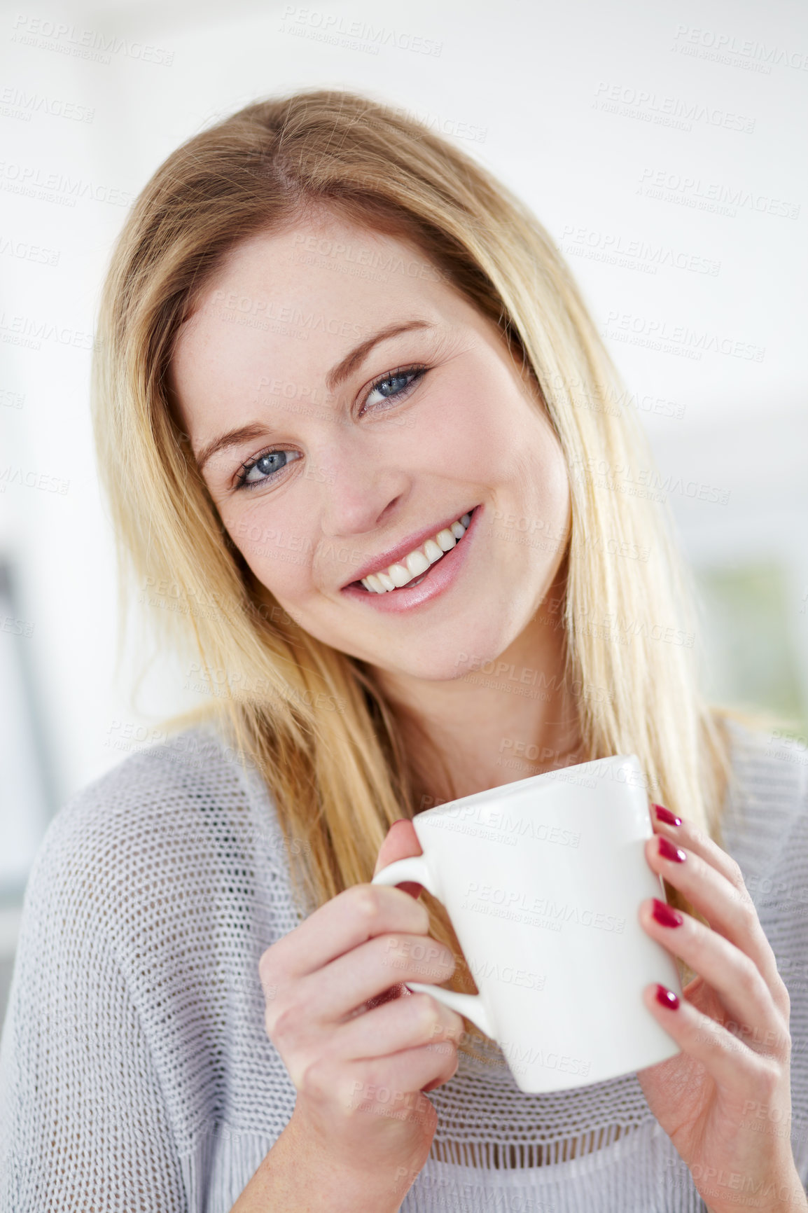 Buy stock photo Smile, relax and portrait of woman with coffee in a kitchen, calm and content in her home. Happy, face and female drinking tea in her apartment, peaceful and confident with a comforting morning drink
