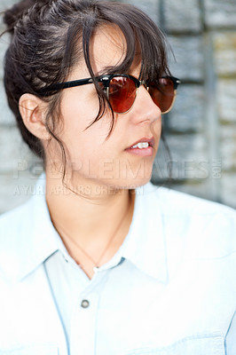 Buy stock photo Sunglasses, thinking and gen z girl in city for travel, confidence and chilling vibes on outdoor trip. Shades, face and female student relax on weekend while traveling in New York for holiday freedom