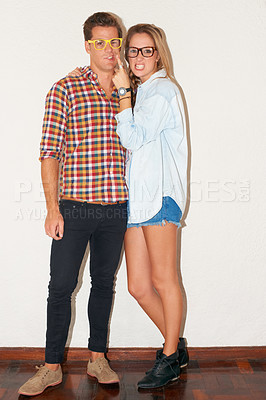 Buy stock photo Crazy portrait of hipster couple with glasses, funny face and gen z fashion with university youth culture. Happiness, goofy woman and man in at fun college, students on white wall background.