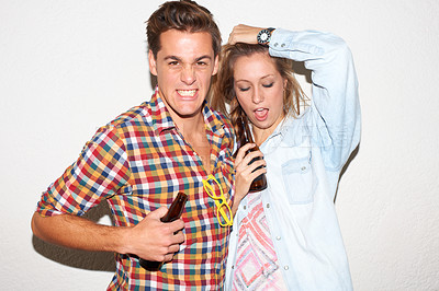 Buy stock photo Portrait of gen z couple at party, beer and drunk face, hipster fashion with university youth culture. Drinks, woman and man in crazy picture at college event, happy friends on white wall background.