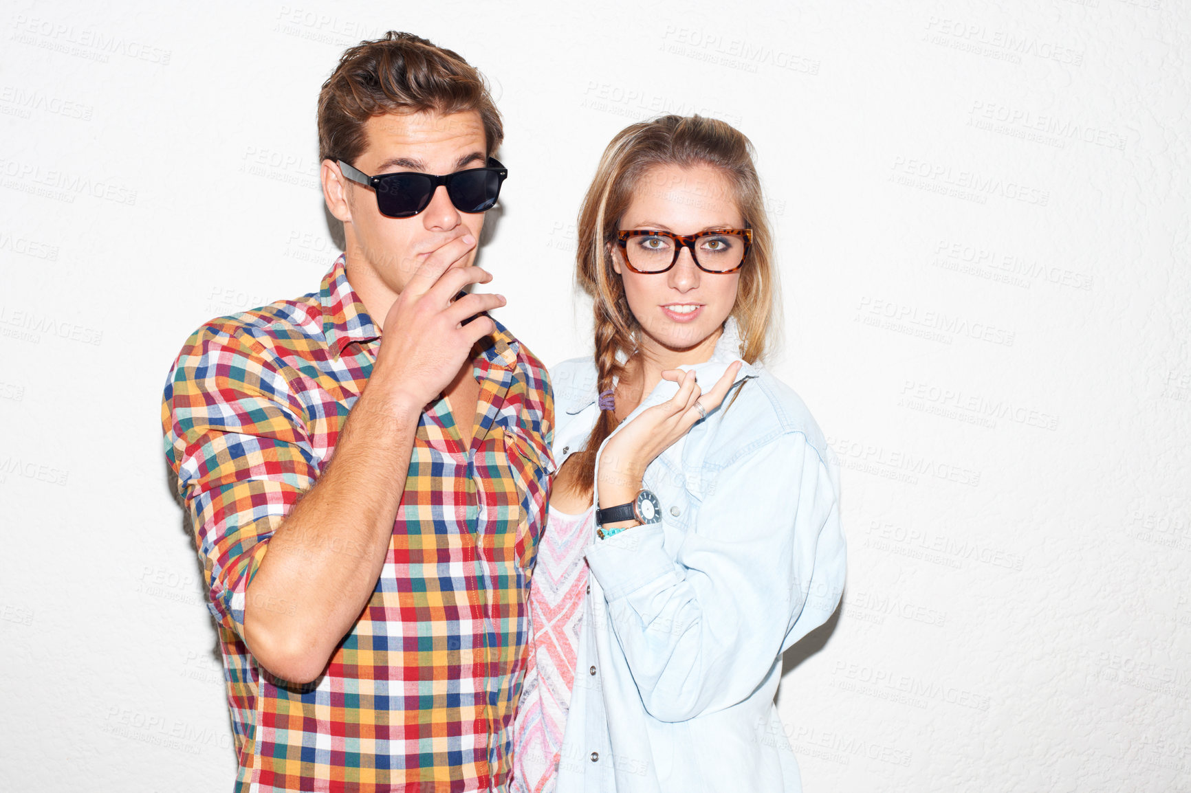 Buy stock photo Portrait of cool couple at party, sunglasses on face and gen z fashion with university culture in youth. Nerd students, woman and man in crazy picture at college, hipster people on wall background.