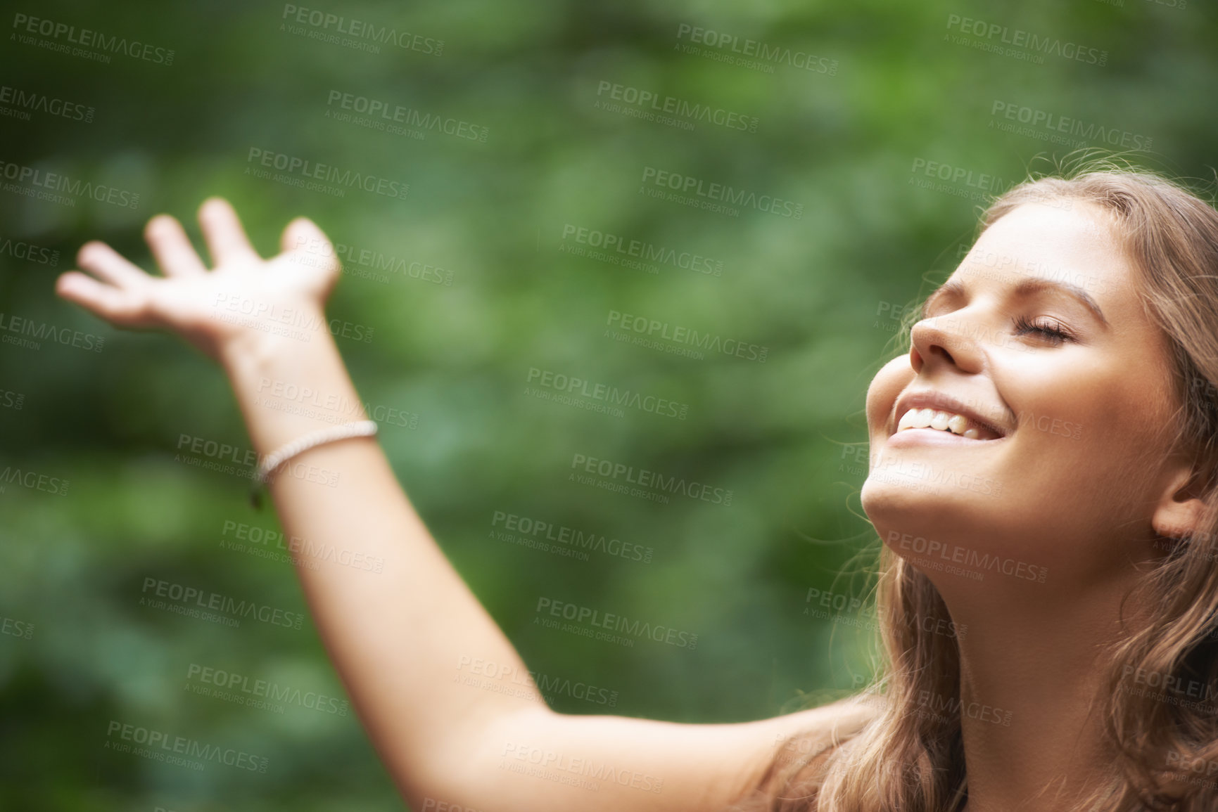 Buy stock photo Smile, freedom and a woman arms raised in a forest for mental health, wellness or zen meditation. Summer, nature and a happy young person in the countryside to relax for peace, balance or mindfulness