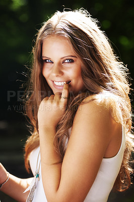 Buy stock photo Portrait, flirt and a woman in the forest on a green background for freedom, travel or to relax. Face, smile and a happy young person in the countryside or woods for wellness or stress relief