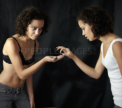 Buy stock photo Diet, pills and woman with anorexia in studio for mental health, crisis or problem on black background. Weight loss, medication and obsession by lady with body dysmorphia, bulimia or eating disorder