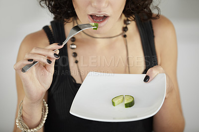 Buy stock photo Shot of a young woman suffering from anorexia