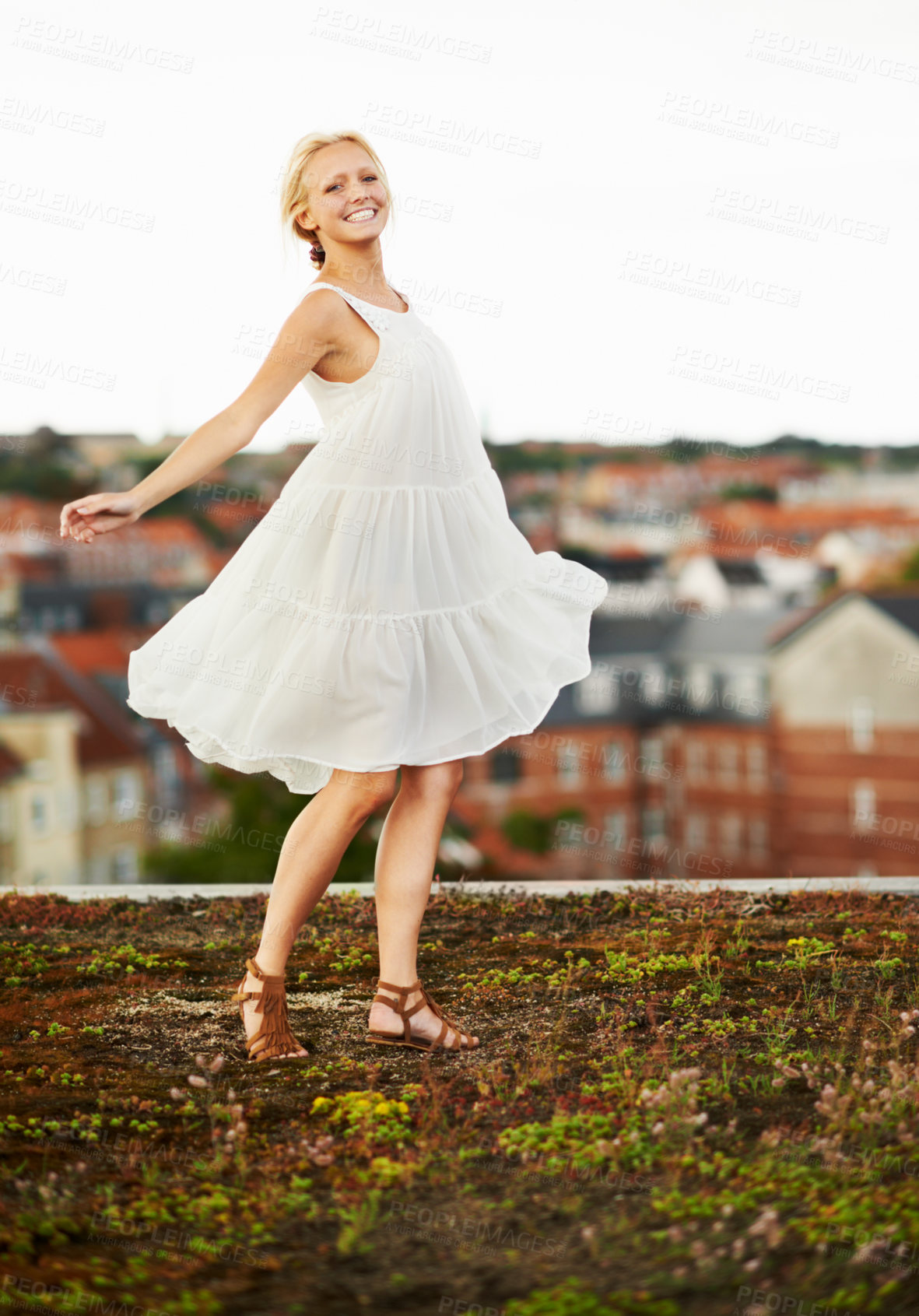 Buy stock photo Woman, happiness and spinning on holiday, summer and outdoor for vacation, smiling and city. Wind, dancer and urban area for break, getaway and carefree on trip, dancing and amsterdam spring time