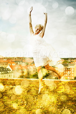 Buy stock photo Portrait, freedom and jump with a woman on a roof in the city and fun against a bokeh effect. Smile, neighborhood or arms raised and a happy young person with energy outdoor to dance in summer