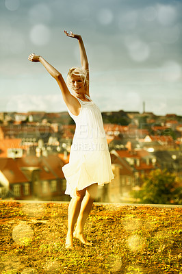 Buy stock photo Dancing, portrait and freedom of woman outdoor on holiday, vacation or travel in city. Happy blonde person with arms raised in celebration, smile and moving with energy in Amsterdam in summer bokeh