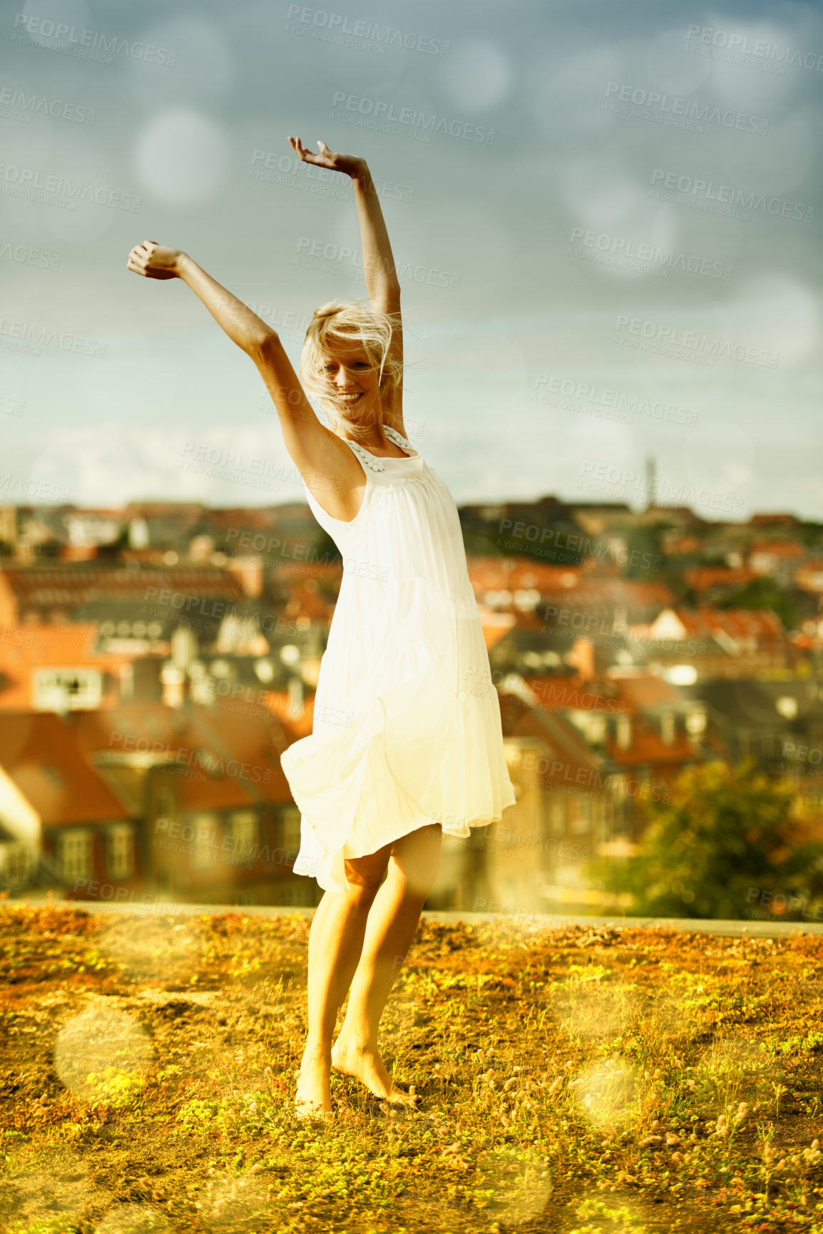 Buy stock photo Dancing, portrait and freedom of woman outdoor on holiday, vacation or travel in city. Happy blonde person with arms raised in celebration, smile and moving with energy in Amsterdam in summer bokeh