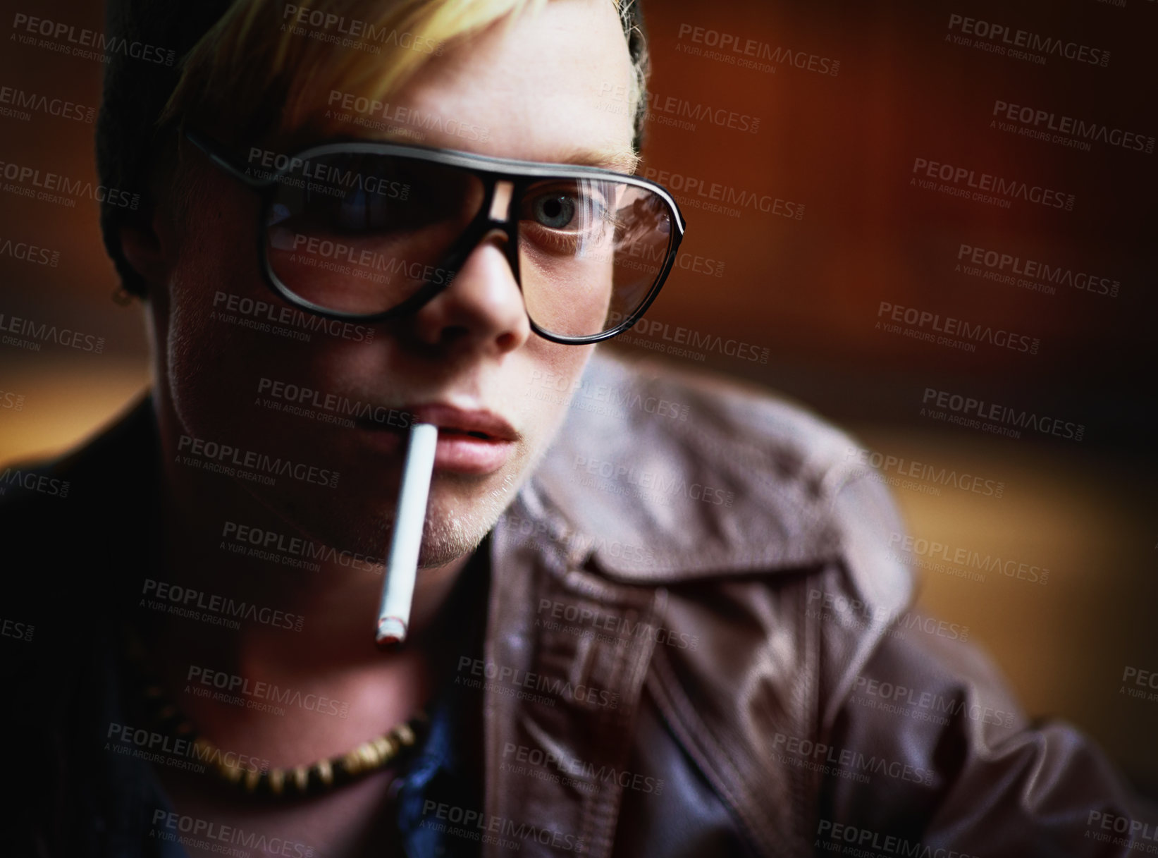 Buy stock photo Portrait, addiction and a boy smoking a cigarette closeup for nicotine or tobacco dependency in sunglasses. Face, smoke and bad habit with a young person inhaling an addictive substance for cancer