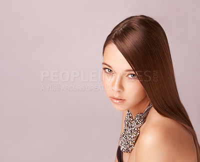 Buy stock photo Cosmetics, portrait or woman with fashion, jewellery and hair care in studio for wellness and beauty. Person, face and skincare with natural glow, keratin or treatment on brown background with mockup