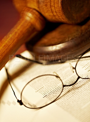 Buy stock photo Law table, document and glasses for jury, notes or work in the courtroom. Paperwork, knowledge and eyewear on an attorney desk for order, legal job or advocate trial for a judgment or crime defense