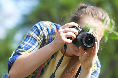 Buy stock photo A gorgeous young woman taking a picture with her camera