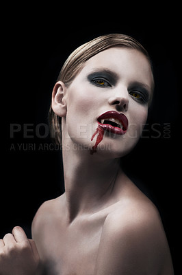 Buy stock photo Portrait, woman and vampire with blood, lady and bare against a dark studio background. Face, female character and girl with fantasy, makeup and cosmetics with cosplay, person and supernatural being