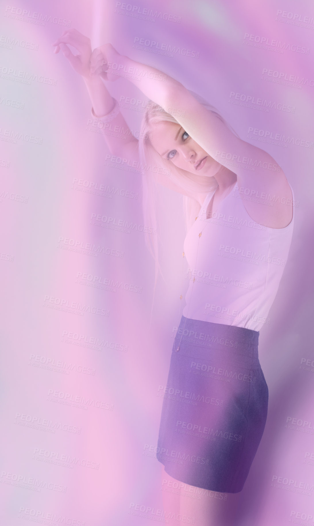 Buy stock photo Portrait of an attractive young female wearing a skirt with colours floating around her