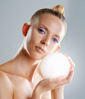 Buy stock photo Beauty, makeup and ball portrait of woman in studio with color eye shadow, creative facial and luxury skincare. Fashion, light cosmetics and face of model with unique aesthetic on white background.
