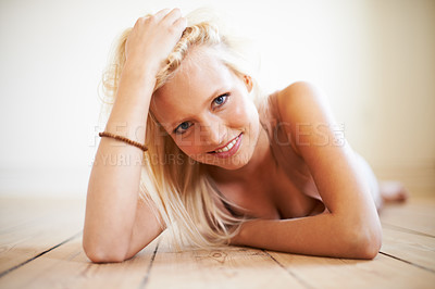 Buy stock photo Shot of a gorgeous young woman relaxing at home